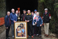Through the Tunnel! Bishop Alphonsus Cullinan and some of the marchers pause outside the Greenway Tunnel on their way to Abbeyside Church. (Tom Keith)